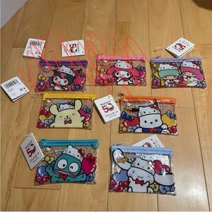 NWT small clear Sanrio pouches